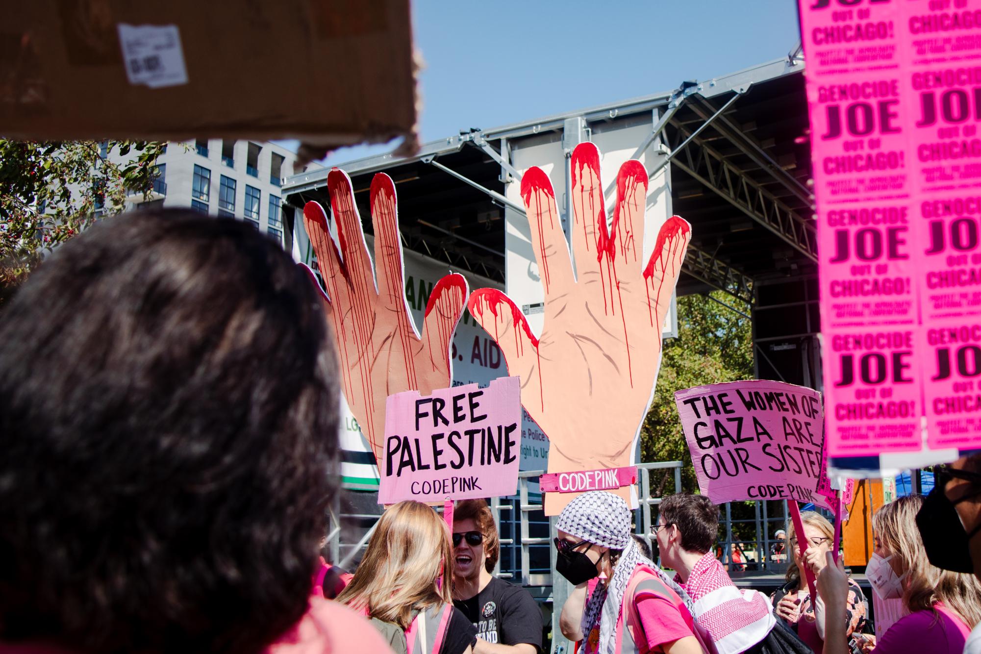 Demonstrators from Code Pink protest the Israel-Hamas war on Monday, Aug. 19. Code Pink, a feminist anti-war organization, is one of over 270 members of the Coalition to March on the DNC.