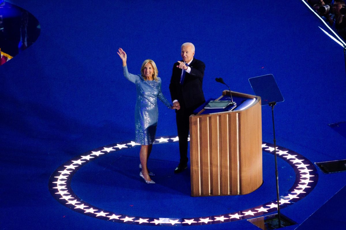 President Joe Biden and First Lady Jill Biden wave to the crowd at the United Center in Chicago on Aug. 19. President Biden addressed the Democratic National Convention as the final speaker of the night.