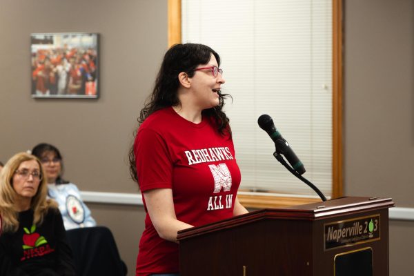 Cait Swinford, a special education assistant at Naperville Central, speaks at the Oct. 7 Board of Education meeting. The Naperville Education Support Professionals Association is currently bargaining with District 203 over a new contract.