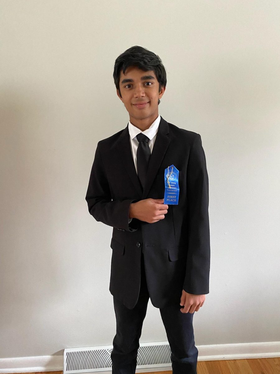 Debabandya Dash poses with his first-place ribbon after his first high school speech competition. Dash was selected to represent Naperville Central in the IHSA State Series as a freshman. (Photo courtesy of Debabandya Dash) 
