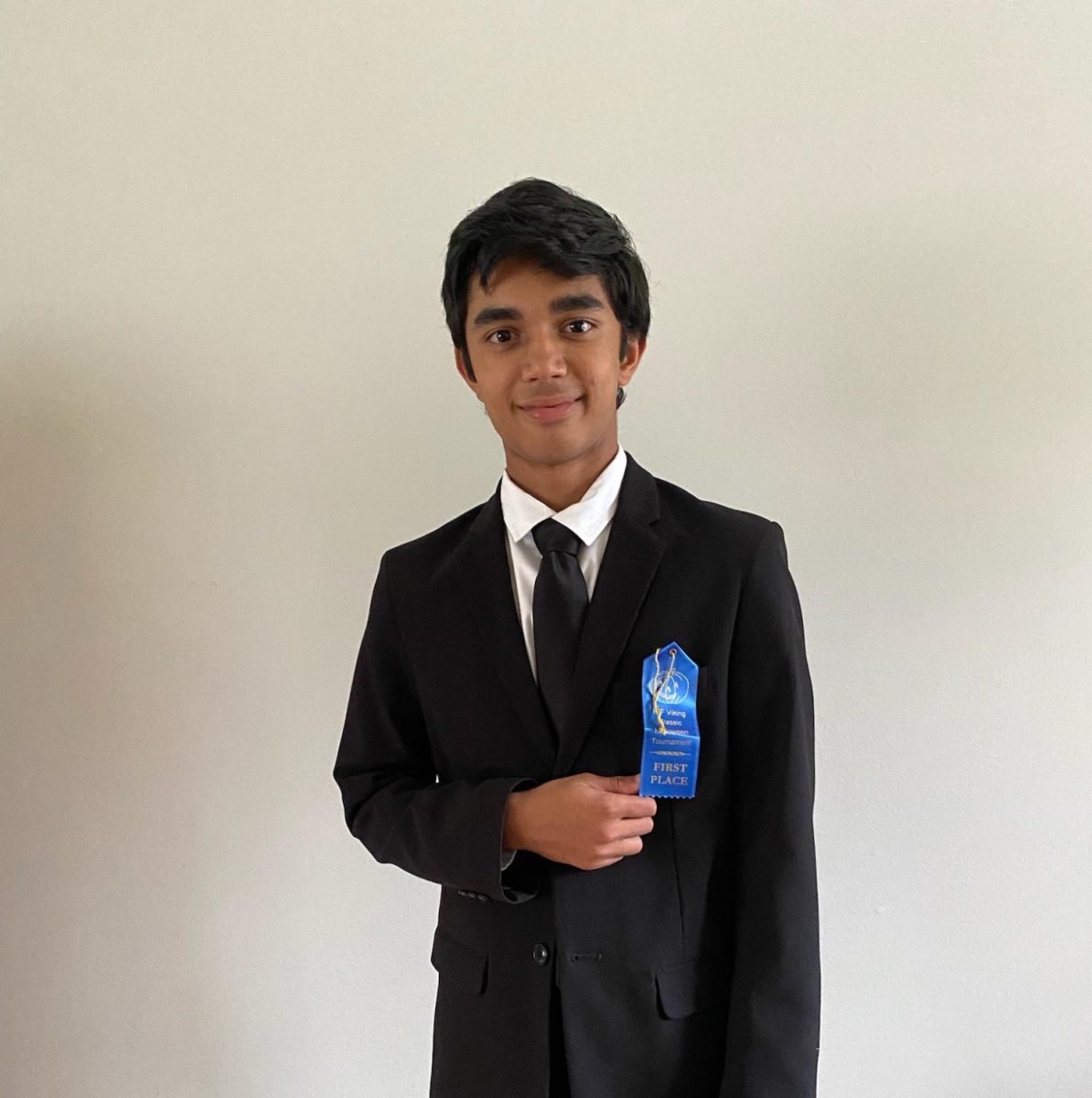 Debabandya Dash poses with his first-place ribbon after his first high school speech competition. Dash was selected to represent Naperville Central in the IHSA State Series as a freshman. (Photo courtesy of Debabandya Dash) 
