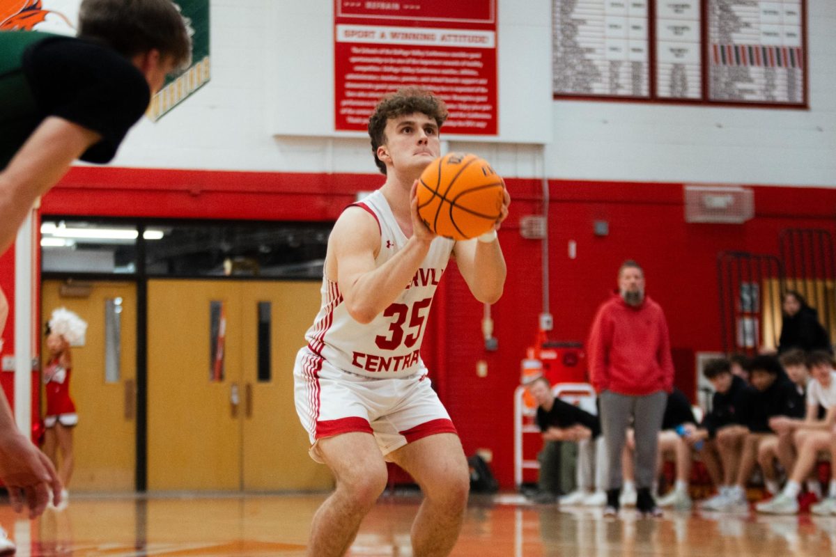 Senior Connor Sands shoots a free throw in a game against Waubonsie Valley on Feb. 19.  Central went on to lose the conference game 59-75.