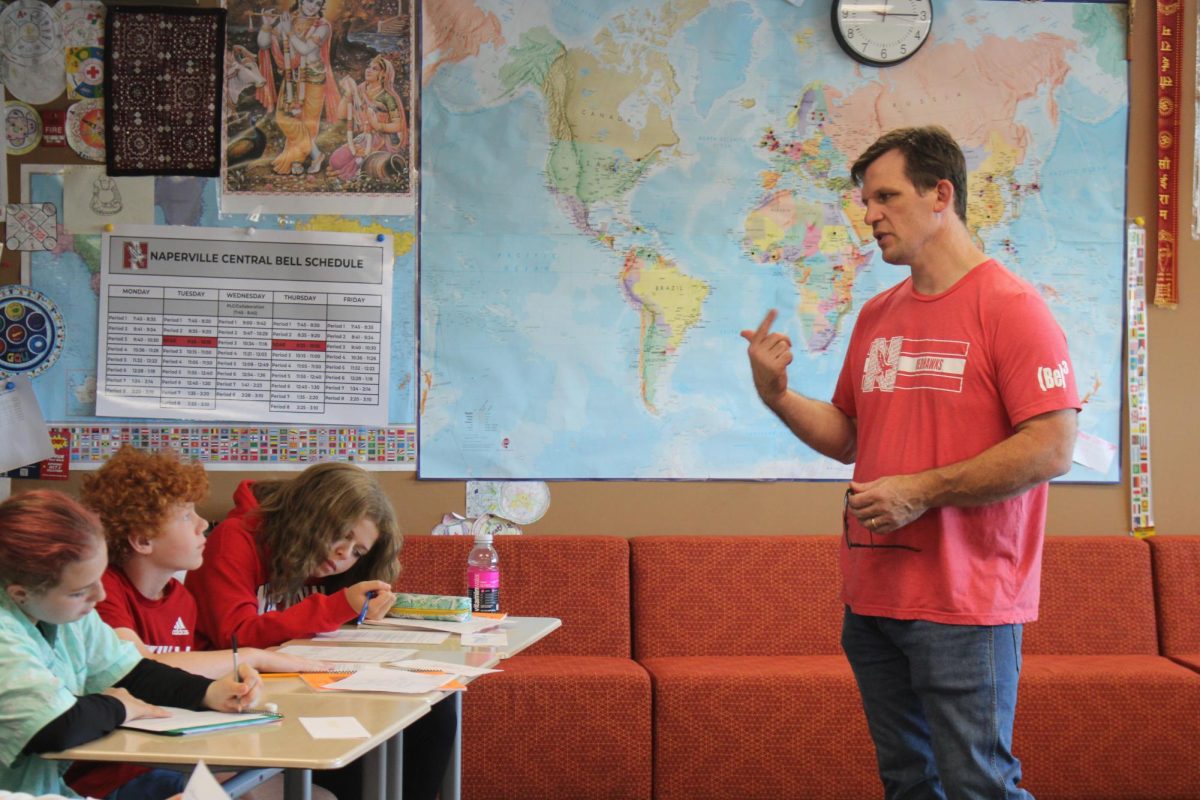 Social studies teacher Seth Brady speaks to students in a World Cultures class in 2022. Under a proposal in front of the board of education, World Cultures, along with three other social studies courses, would be removed starting in the 2026-27 school year.